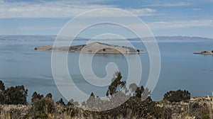 Along the road from San Pedro de Tiquina to Copacabana on the Titicaca lake, the largest highaltitude lake in the world 3808m photo